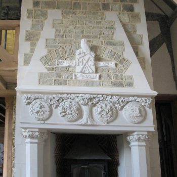 Heavily-Carved-and-Enriched-Gothic-Revival-Fireplace,-Surrey